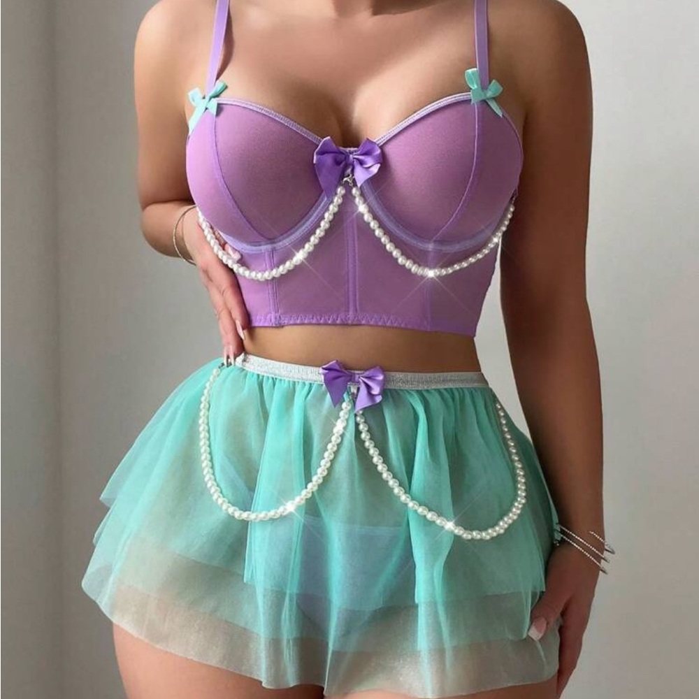 Sheer Green Skirt with Pearl Accents and Purple Bow